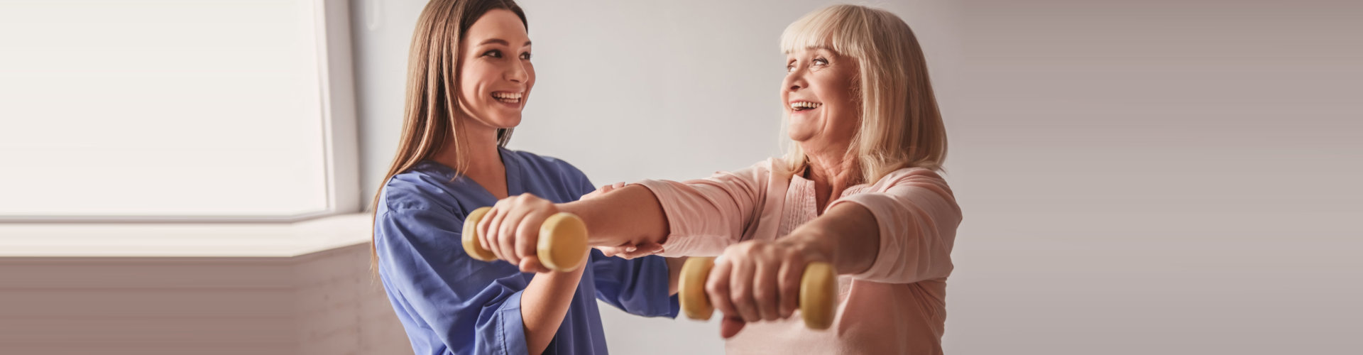 young therapist assisting the old lady